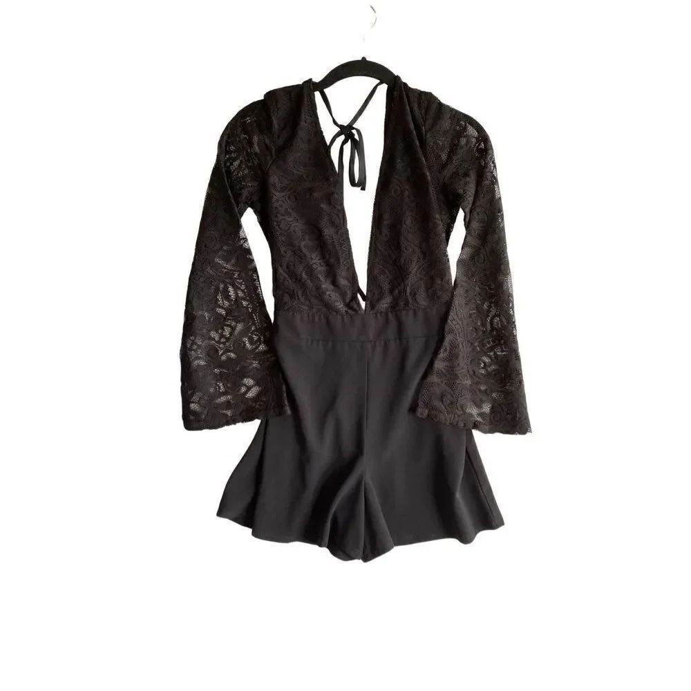Charlotte Russe women’s deep the front and back black lace romper size XS